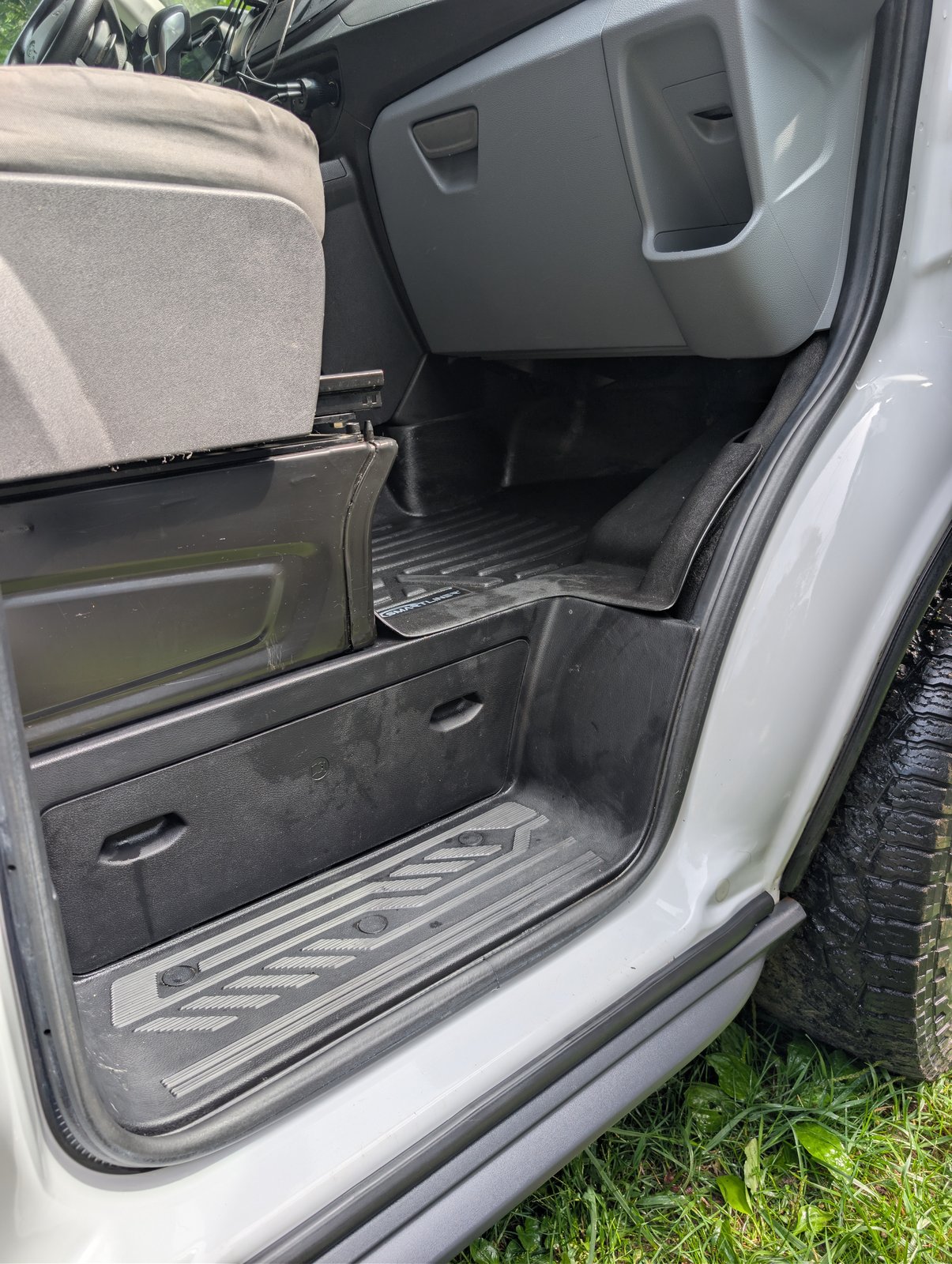 Passenger footwell and step with all-weather floor liners