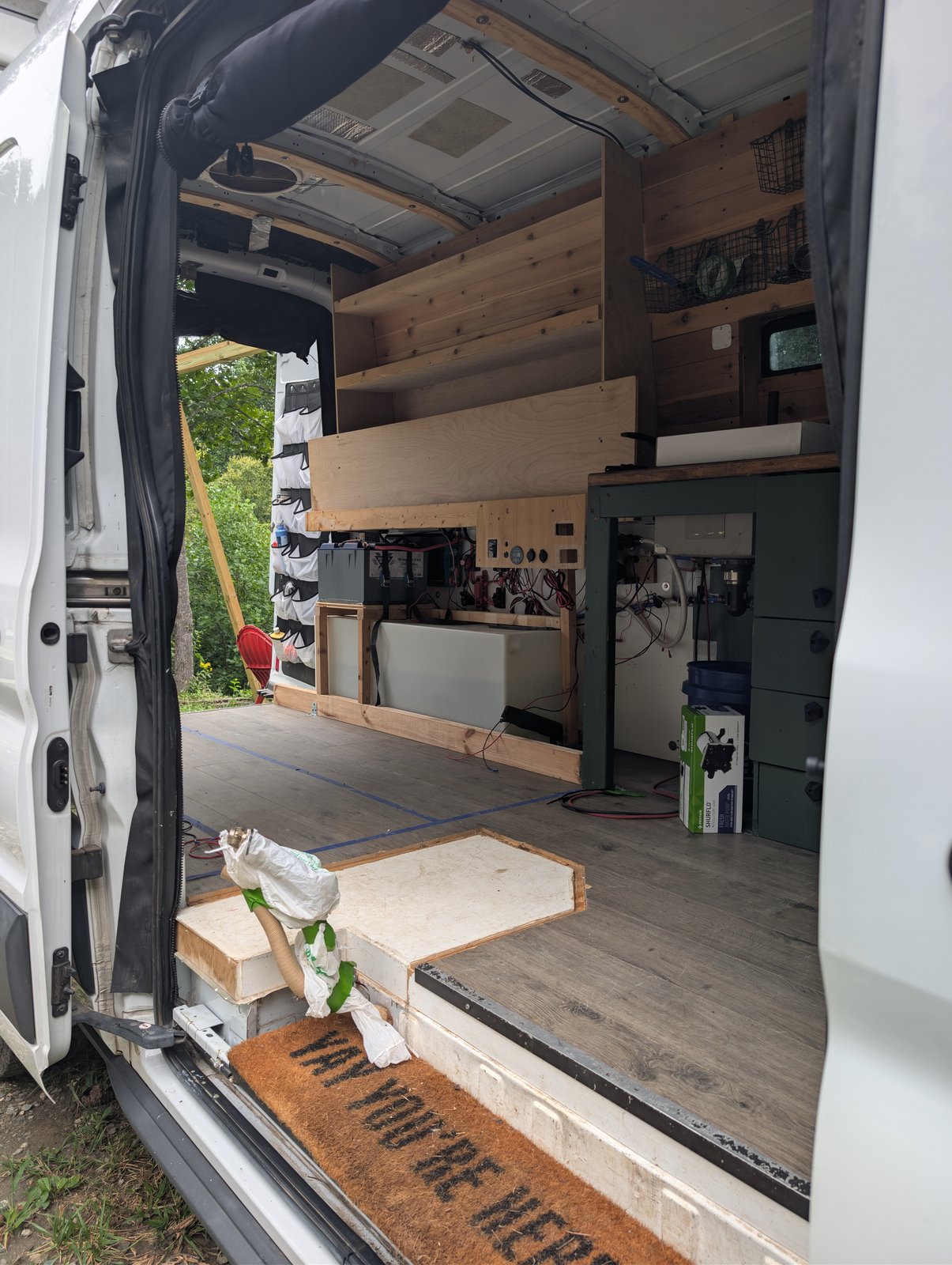 The galley and electrical bay seen through the open sliding door